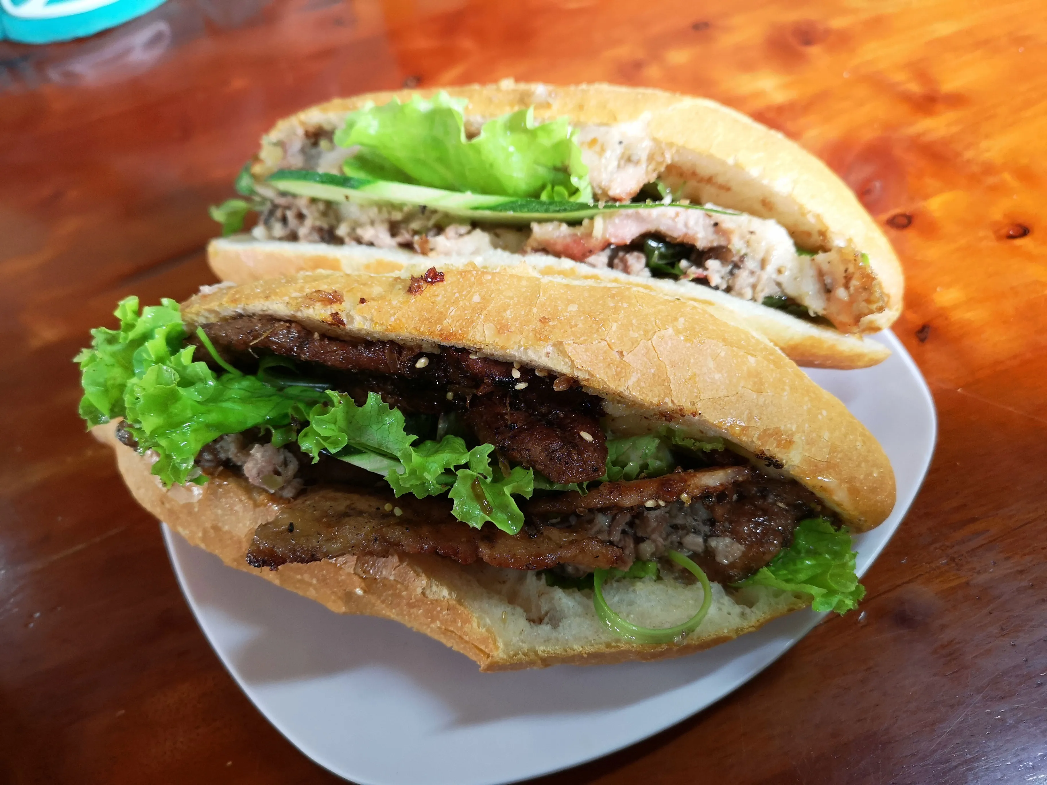 The grilled pork and bbq pork banh mi sandwiches at Banh Mi Phuong.
