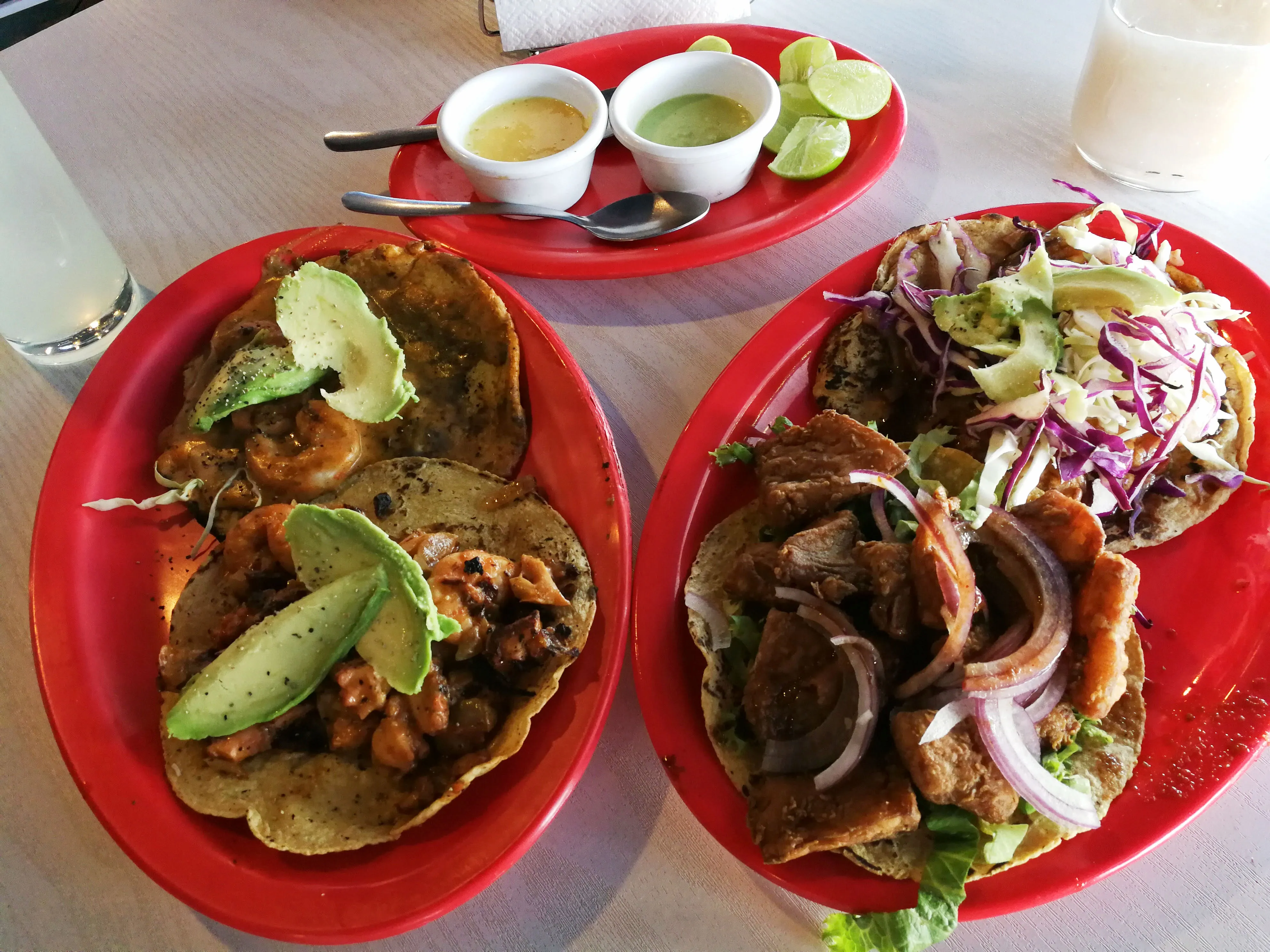 Fish tacos are the perfect lunch for me. They are hot, slightly acid from the lime, carry umami flavour from the seafood, and give you a homey feeling of warm and fresh corn tortillas.